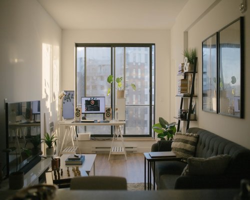 Cozy living room setup for home office with natural light